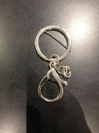 Key ring with chain shown clipped to a swivel lobster hook